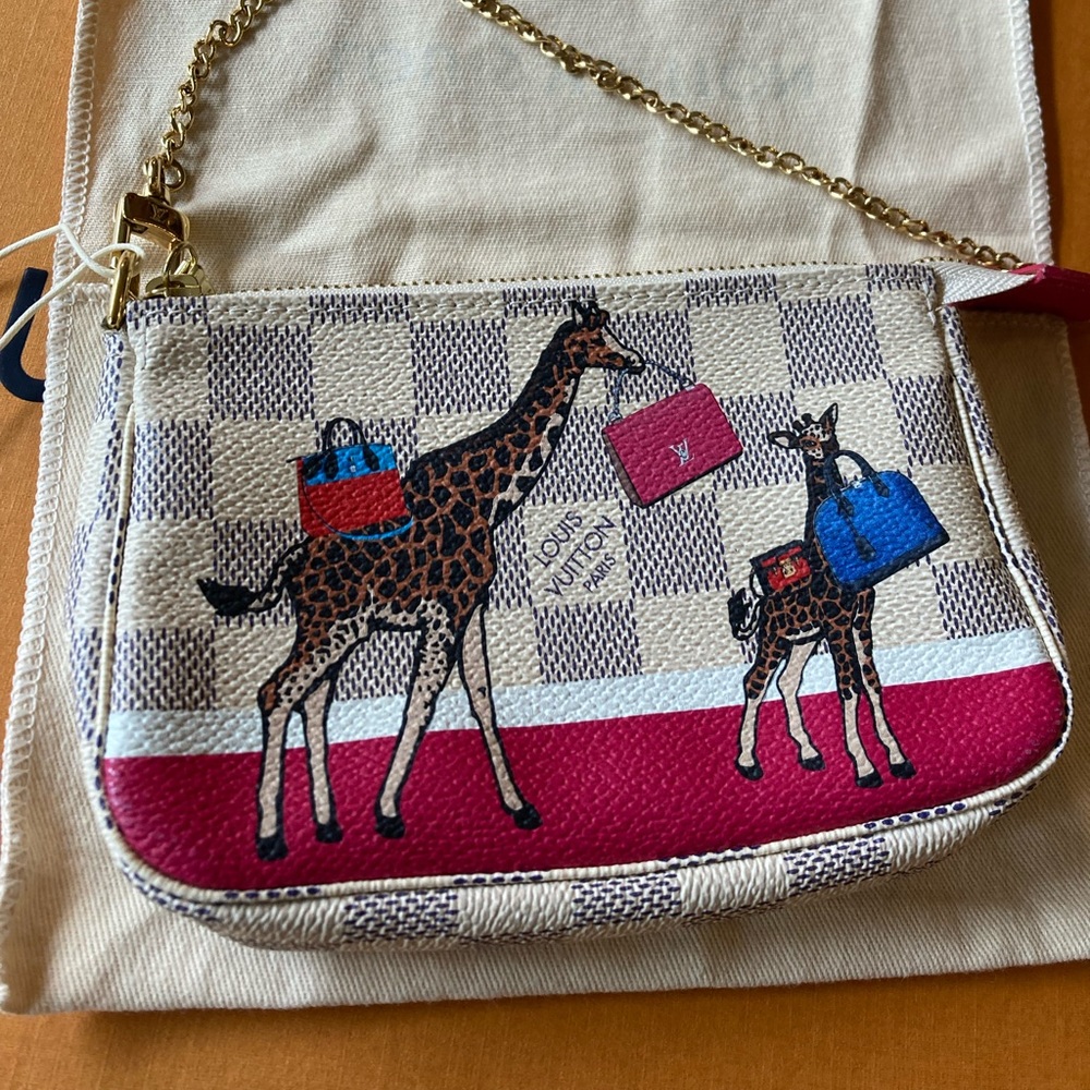 Authentic Louis Vuitton mini pochette in damier azur with Giraffes